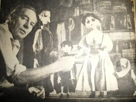 John Wright with marionettes.